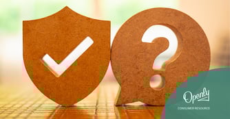 a checkmark medallion next to a question mark thought bubble on a table